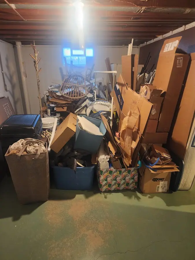 Roll-off dumpster container at job site for Construction Dumpster Rental in Wrentham